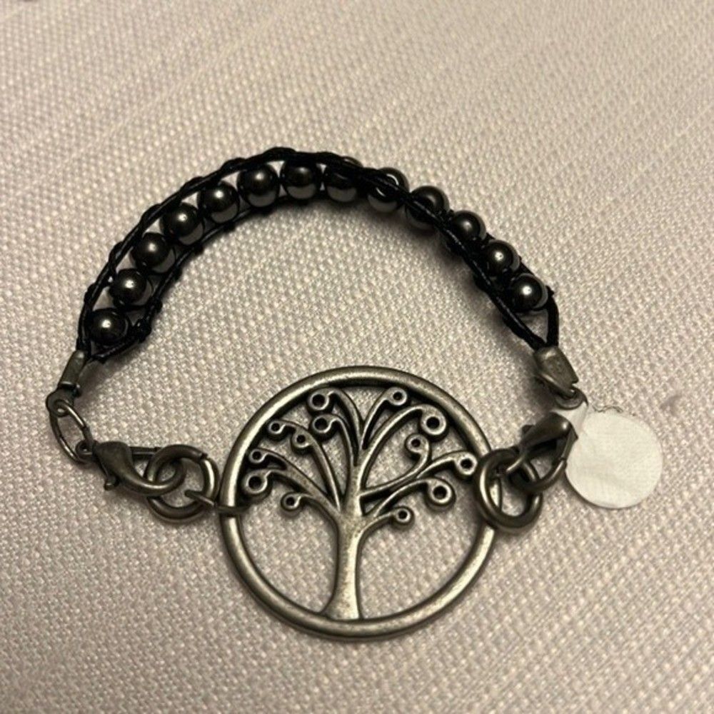 Handcrafted antique silver tone tree medallion on black bead bracelet